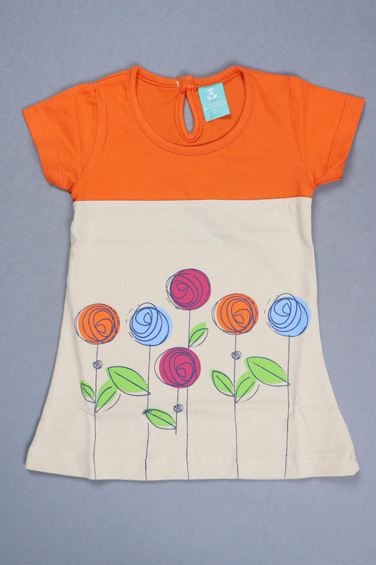 Orange and cream cotton kids t-shirt with colorful flower print and short sleeves