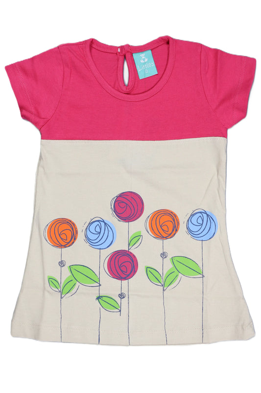 "A professional product showcase of the Fyst girls' flared graphic dress featuring a striking pink and cream color-block design. The primary image highlights the soft cotton bodice in bright pink and a cream-colored skirt decorated with stylized blue, orange, and red roses with green leaves. Detailed thumbnails provide a 360-degree view, including the back profile with its functional keyhole button closure and a close-up of the high-quality floral print, emphasizing the playful silhouette and premium fabric