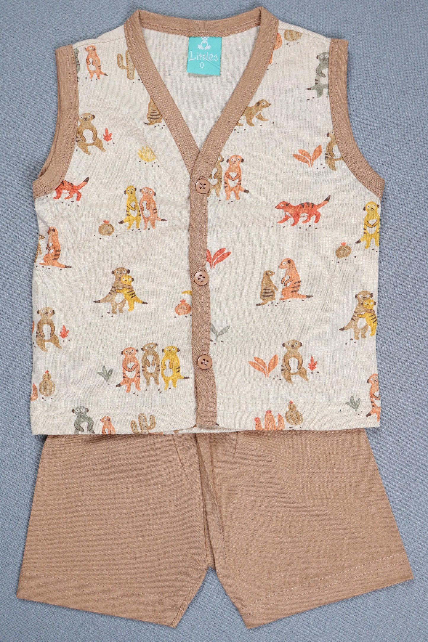 Baby romper with bear pattern on a gray background