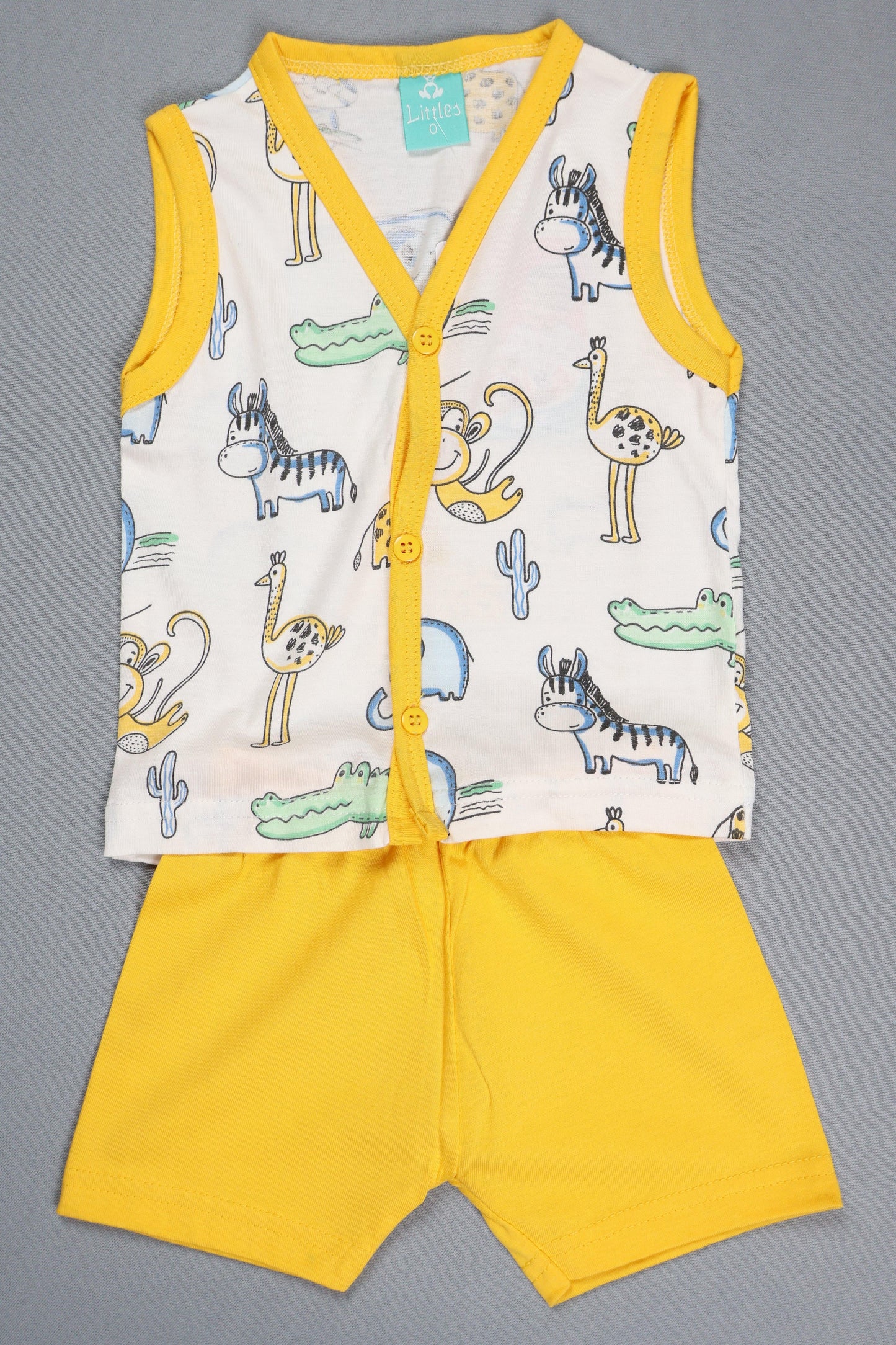 "A professional product showcase of the Fyst girls' sleeveless jabla and shorts set featuring a cheerful safari animal theme. The primary image displays a soft cotton jabla with a white base and a variety of colorful animal illustrations—including zebras, monkeys, and giraffes—detailed with a functional front-button closure and bright yellow ribbed binding at the V-neckline. It is paired with matching solid yellow elasticated shorts. Supplementary images provide a 360-degree view, including the clean back p