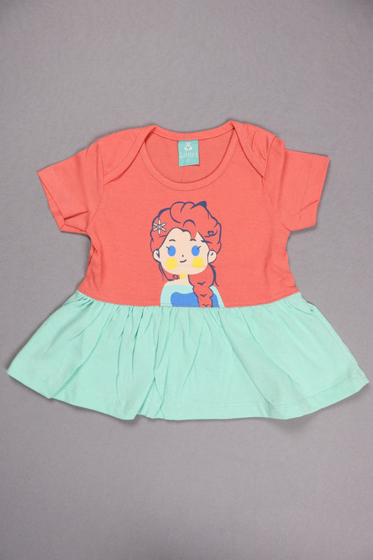 Coral and mint green cotton baby dress with cartoon girl print, short sleeves, flat lay