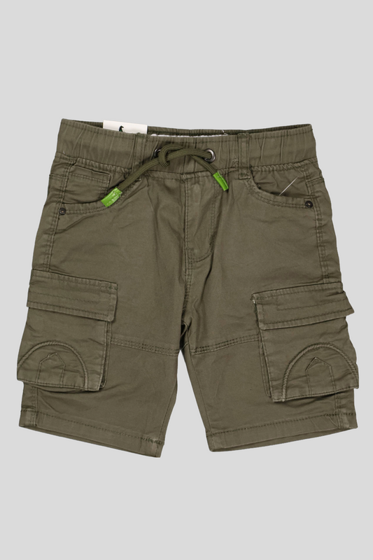 Green cargo shorts with multiple pockets on a gray background