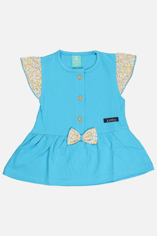 Blue dress with floral sleeves and bow on a white background