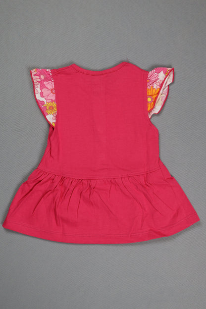 Red dress with floral lining on a gray background