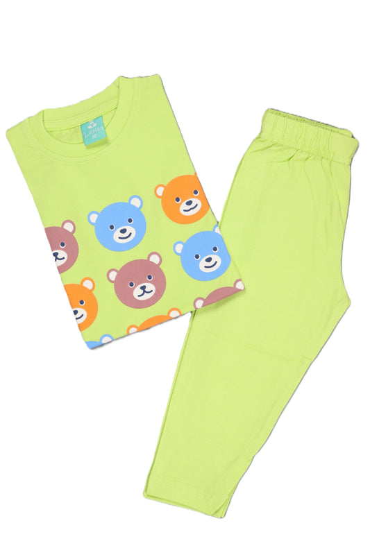 Kids' two-piece loungewear set in vibrant lime green. The top features a whimsical "Cute Bear" graphic print with multicolored bear characters, while the bottoms are full-length matching trousers.