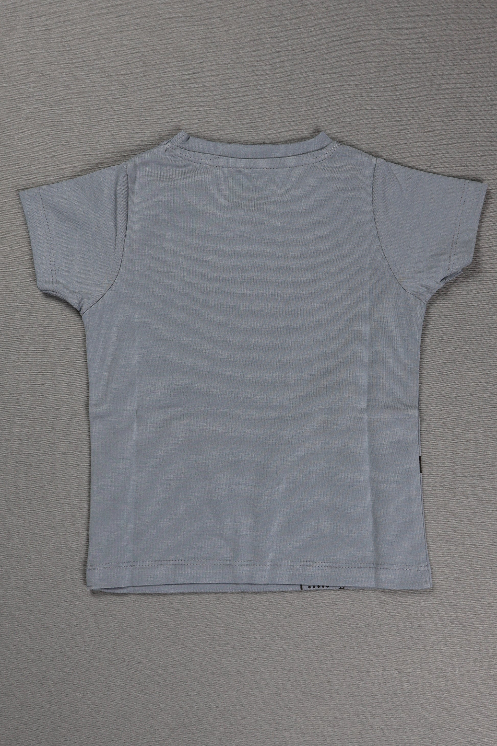Light blue t-shirt on a gray background