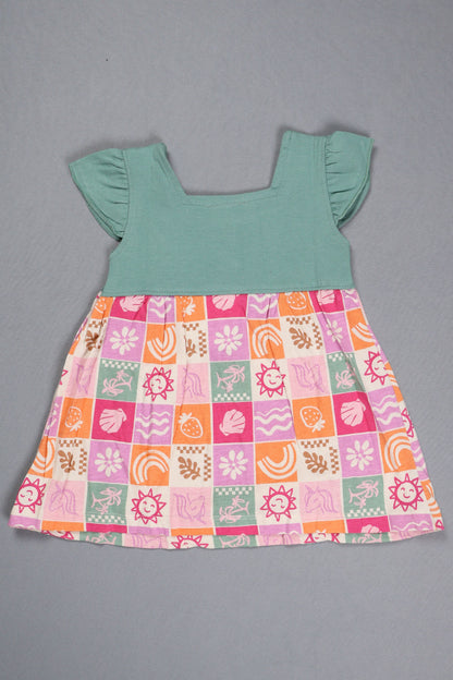 Fyst baby girl dress featuring a teal flutter-sleeve knit top with button details and a multi-color checkered skirt with sun, shell, and floral prints.