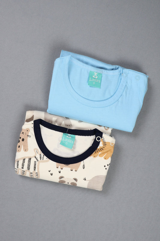 Two folded shirts, one light blue and one with a pattern, on a gray background