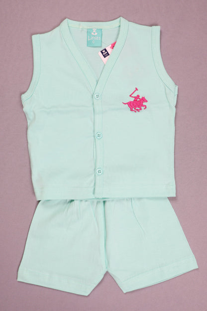 Light blue shirt with pink logo on a pink background
