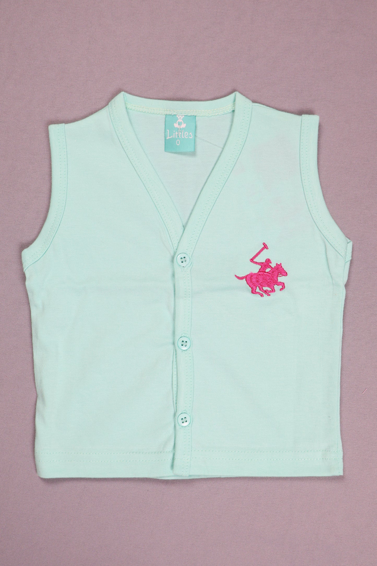 Light blue sleeveless shirt with pink logo on a pink background