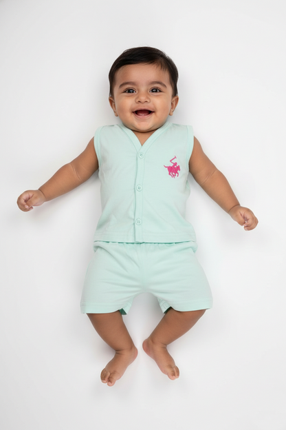 Smiling baby wearing sea green cotton knit vest and shorts set, sleeveless, on white background