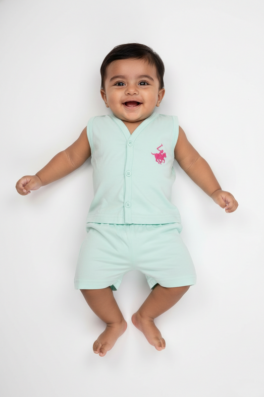 Smiling baby wearing sea green cotton knit vest and shorts set, sleeveless, on white background