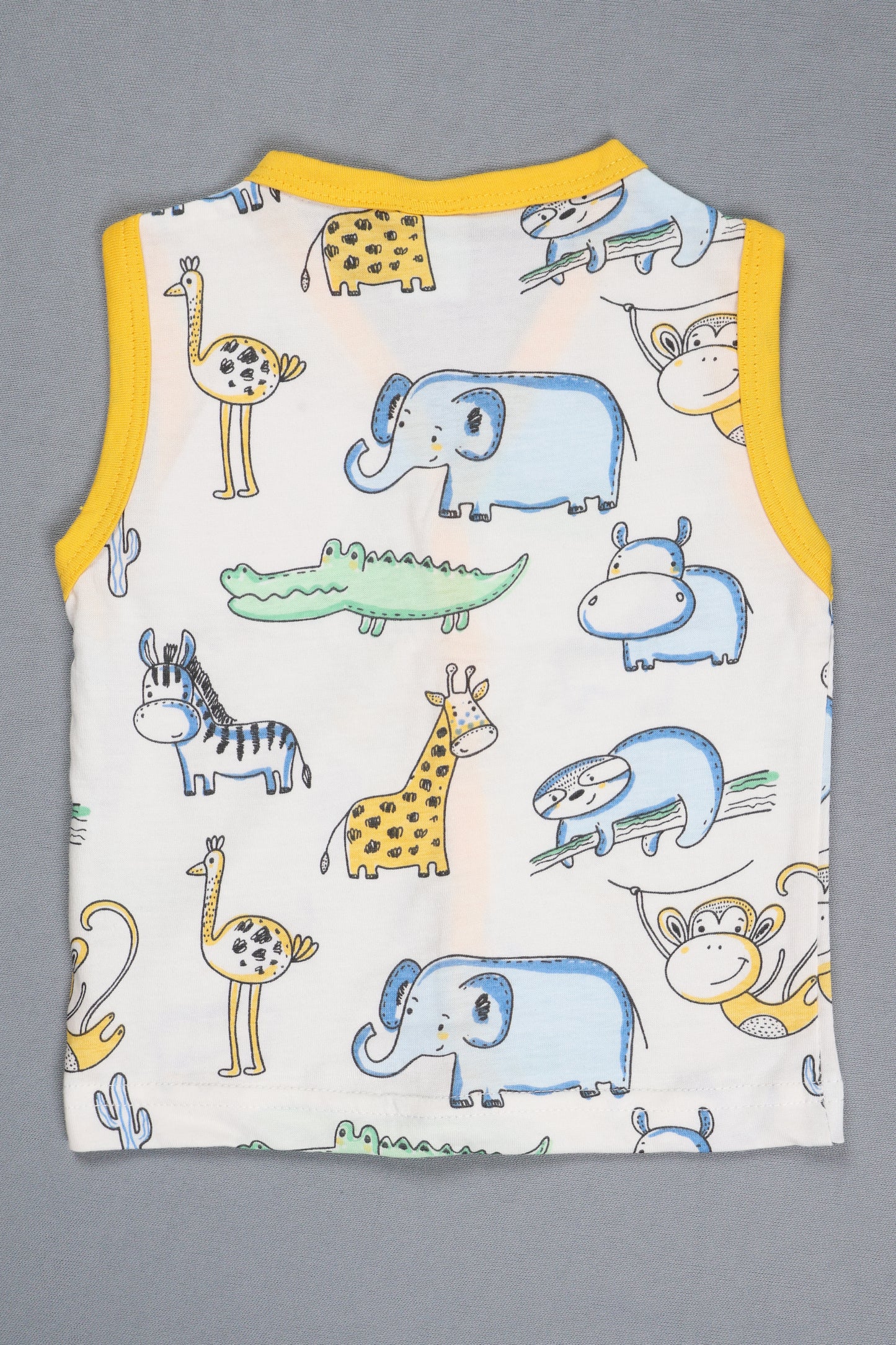 Baby romper with animal pattern on a gray background