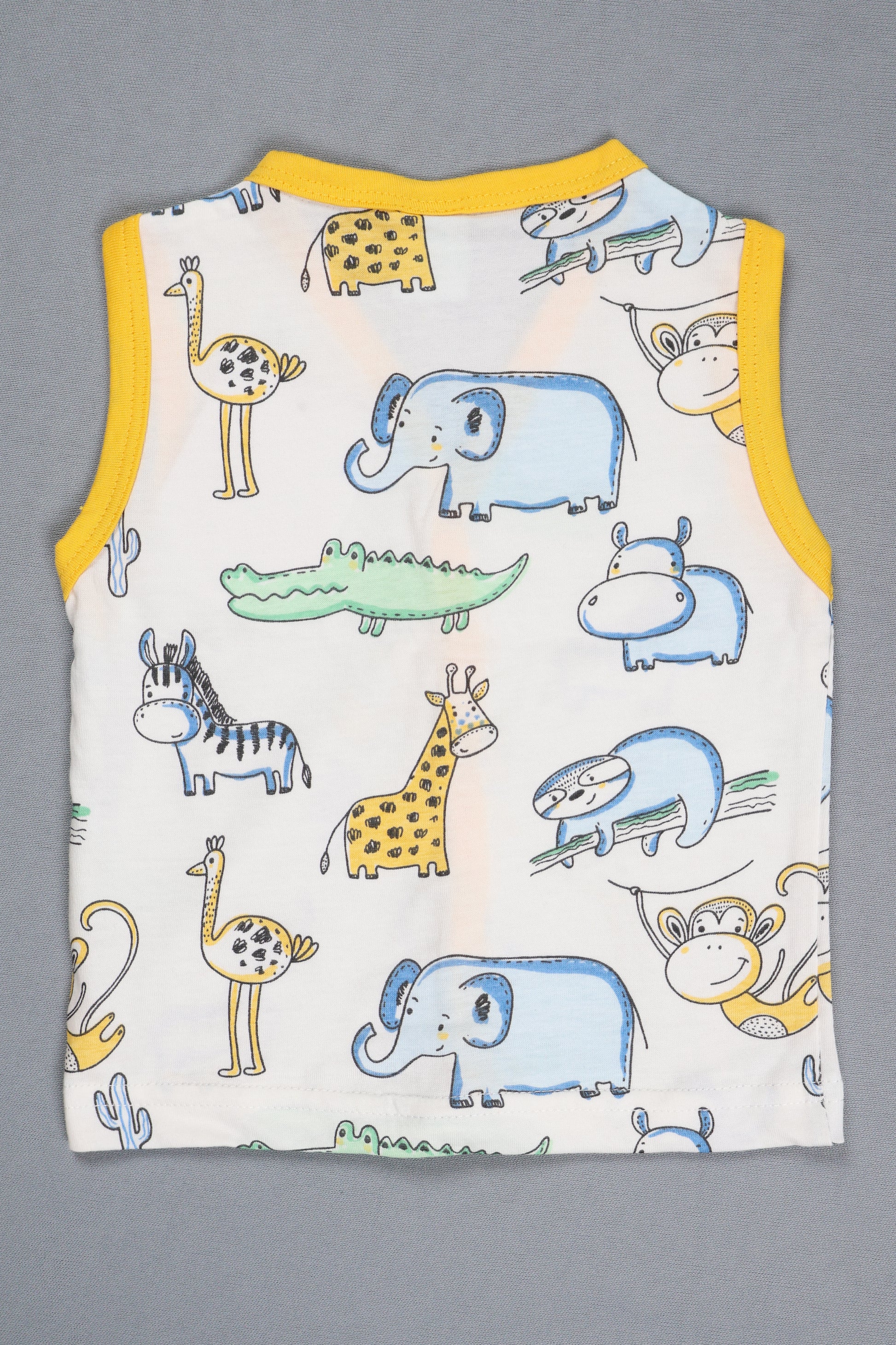 Baby romper with animal pattern on a gray background
