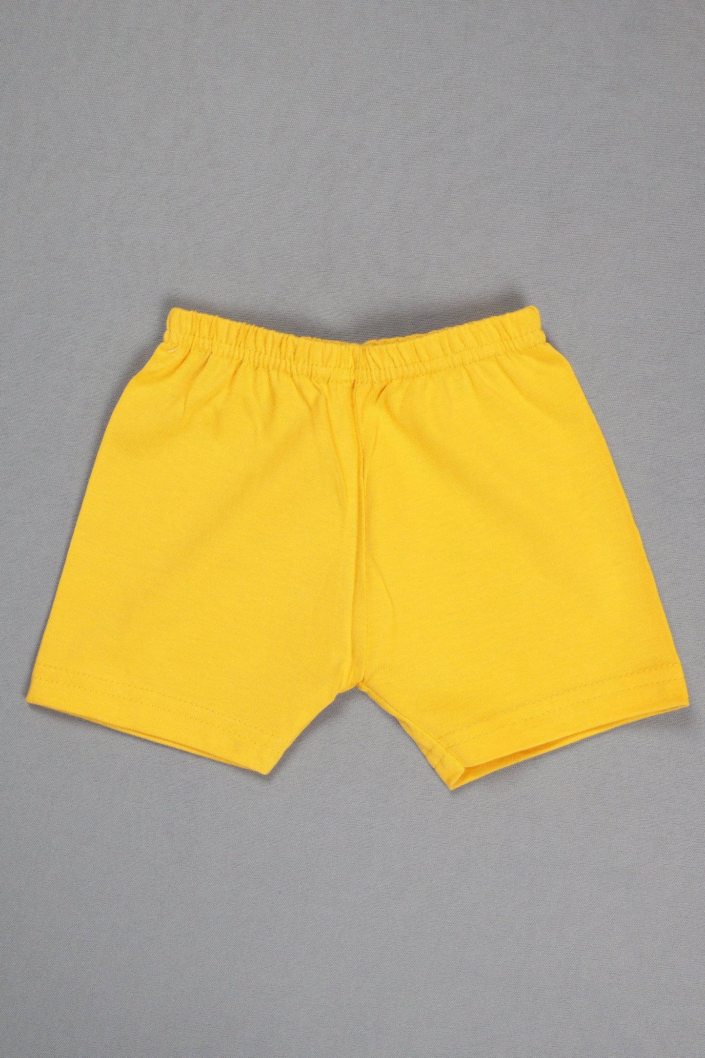 Yellow shorts on a gray background