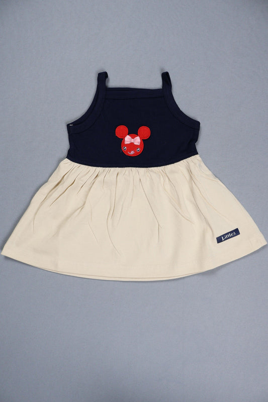 Children's dress with a red bow design on a gray background