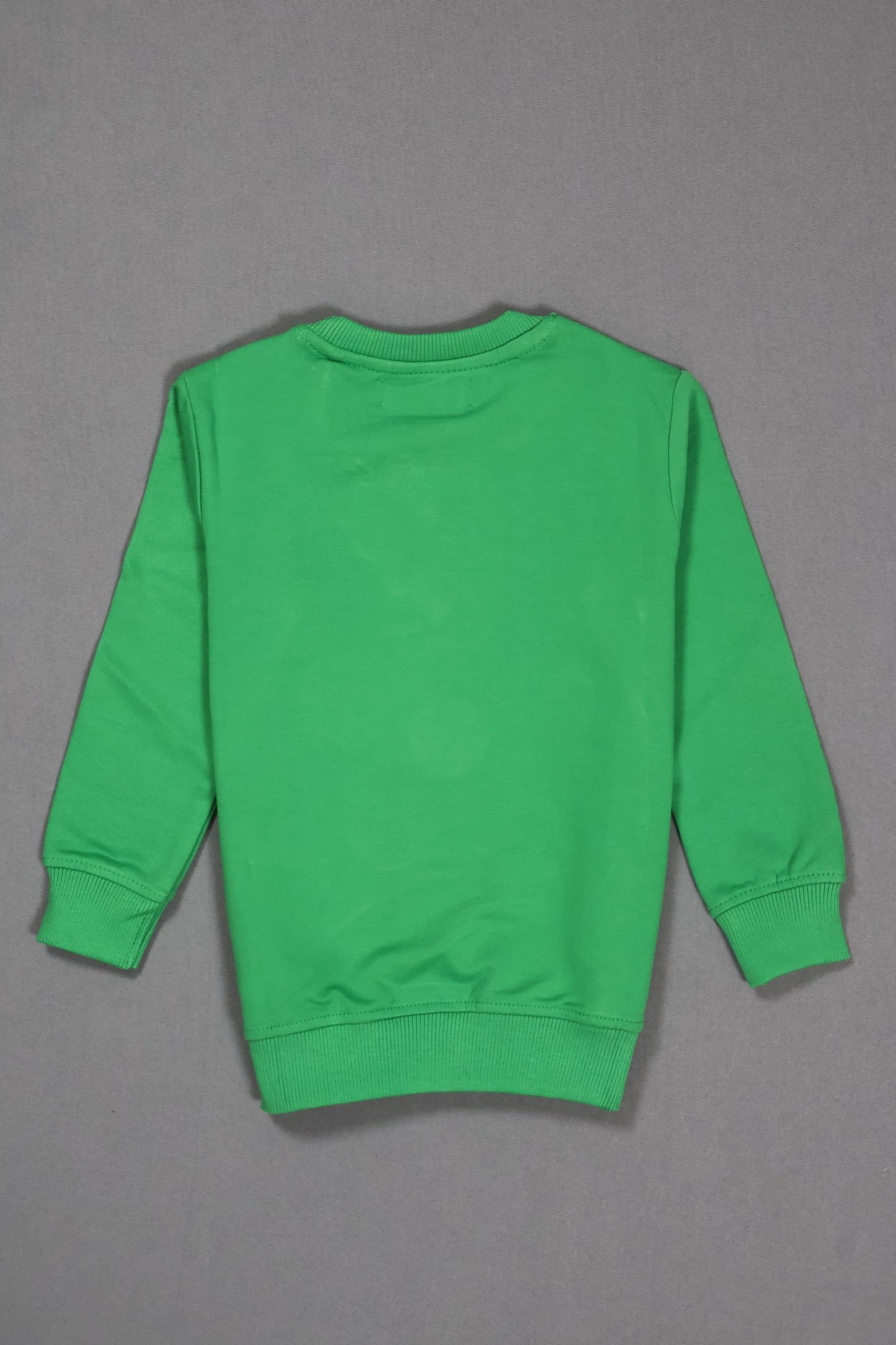 Green long-sleeve shirt on a gray background