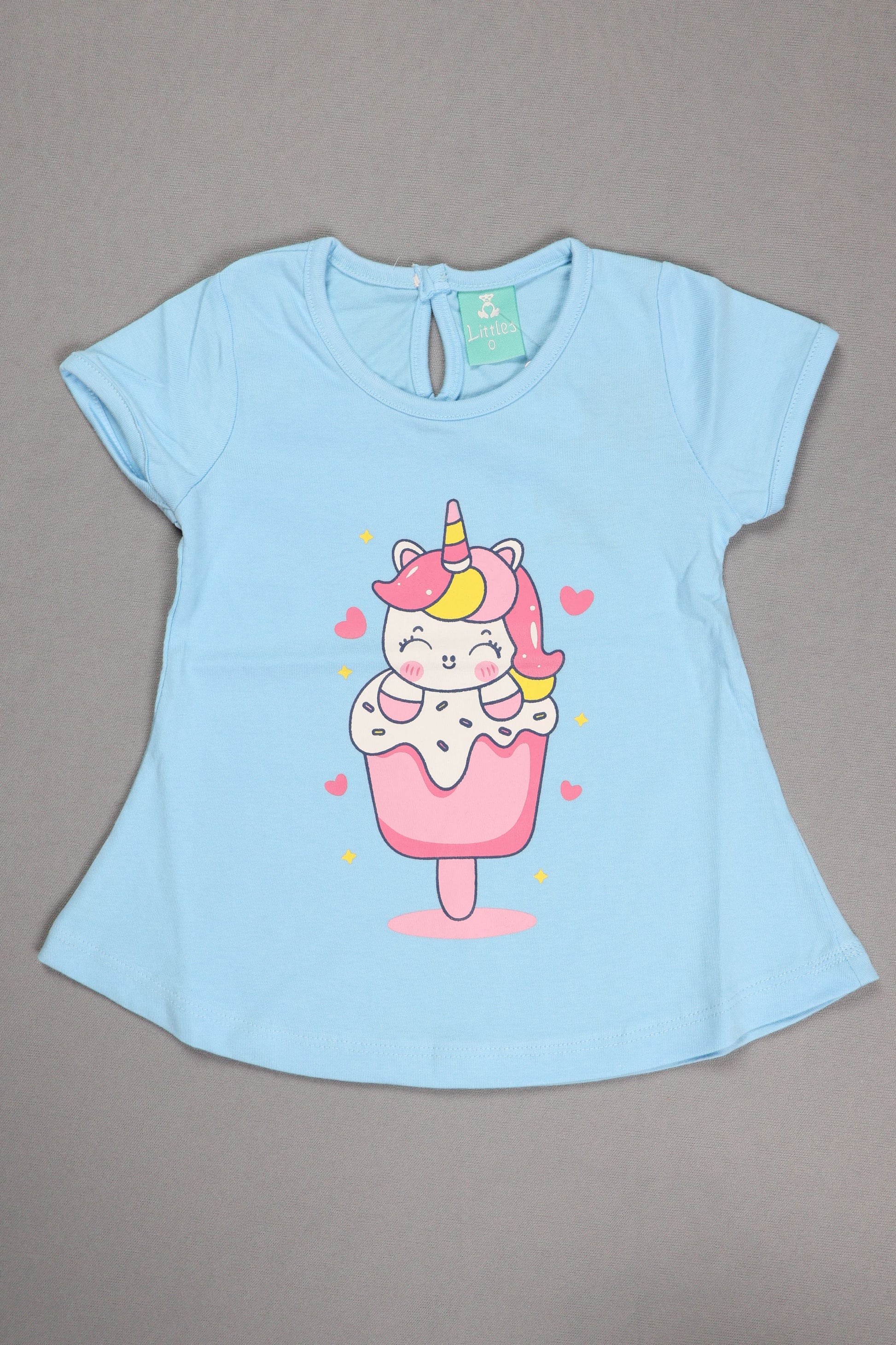Light blue pet shirt with a unicorn ice cream design on a gray background