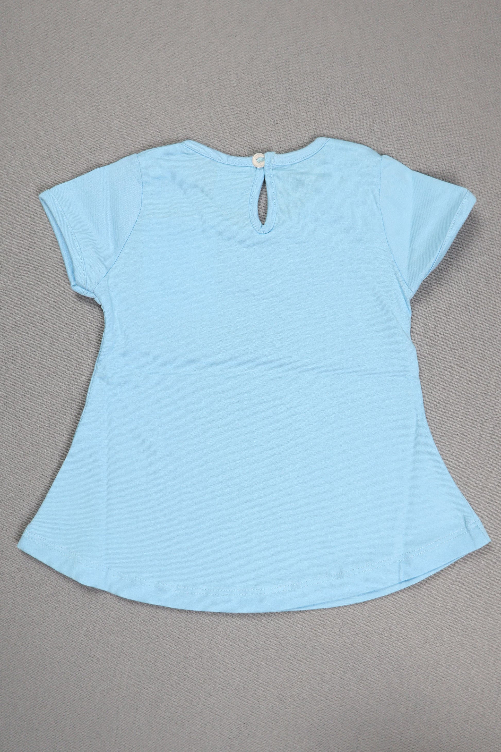 Light blue fabric piece on a gray background