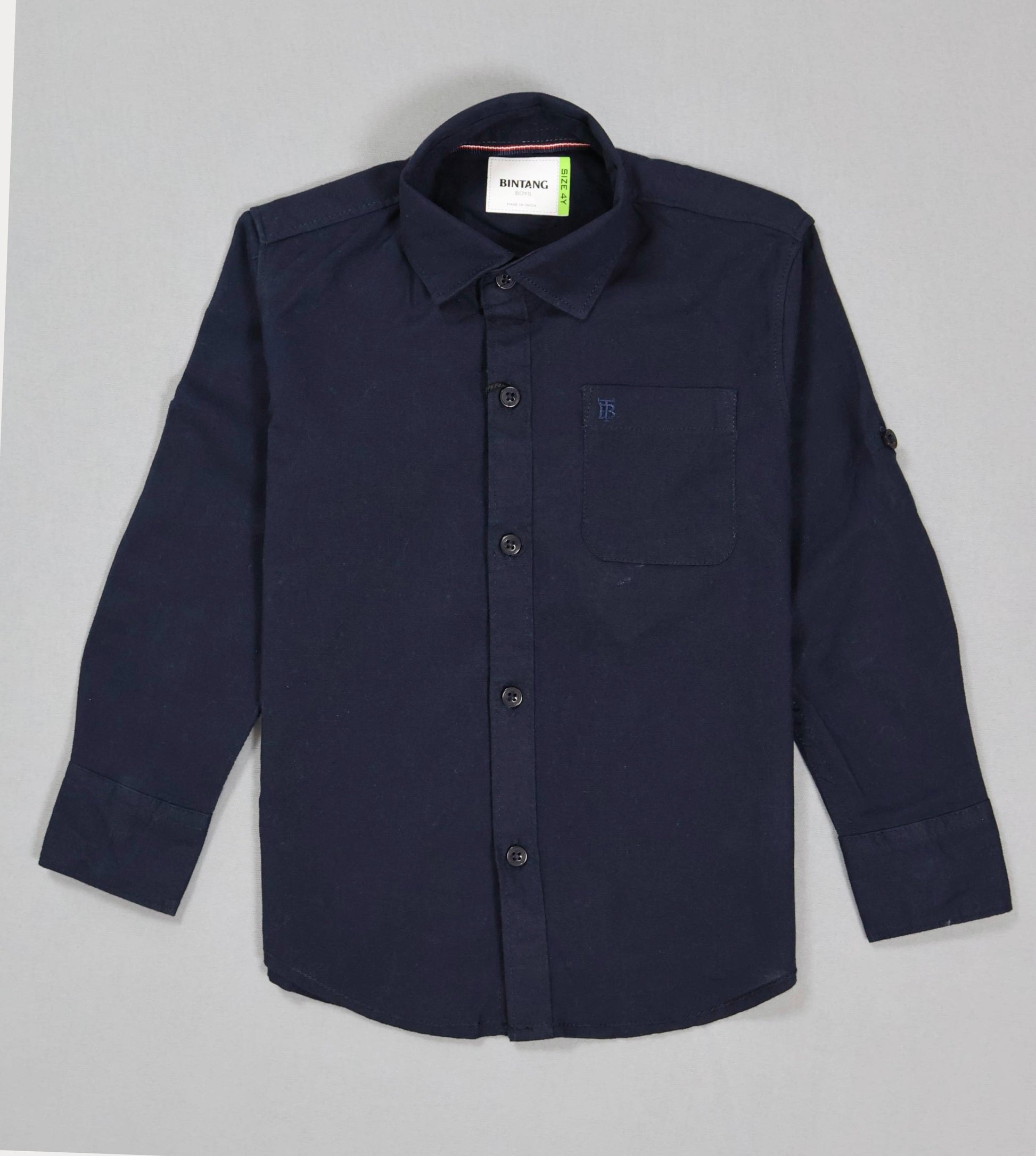 Navy blue button-up shirt on a gray background