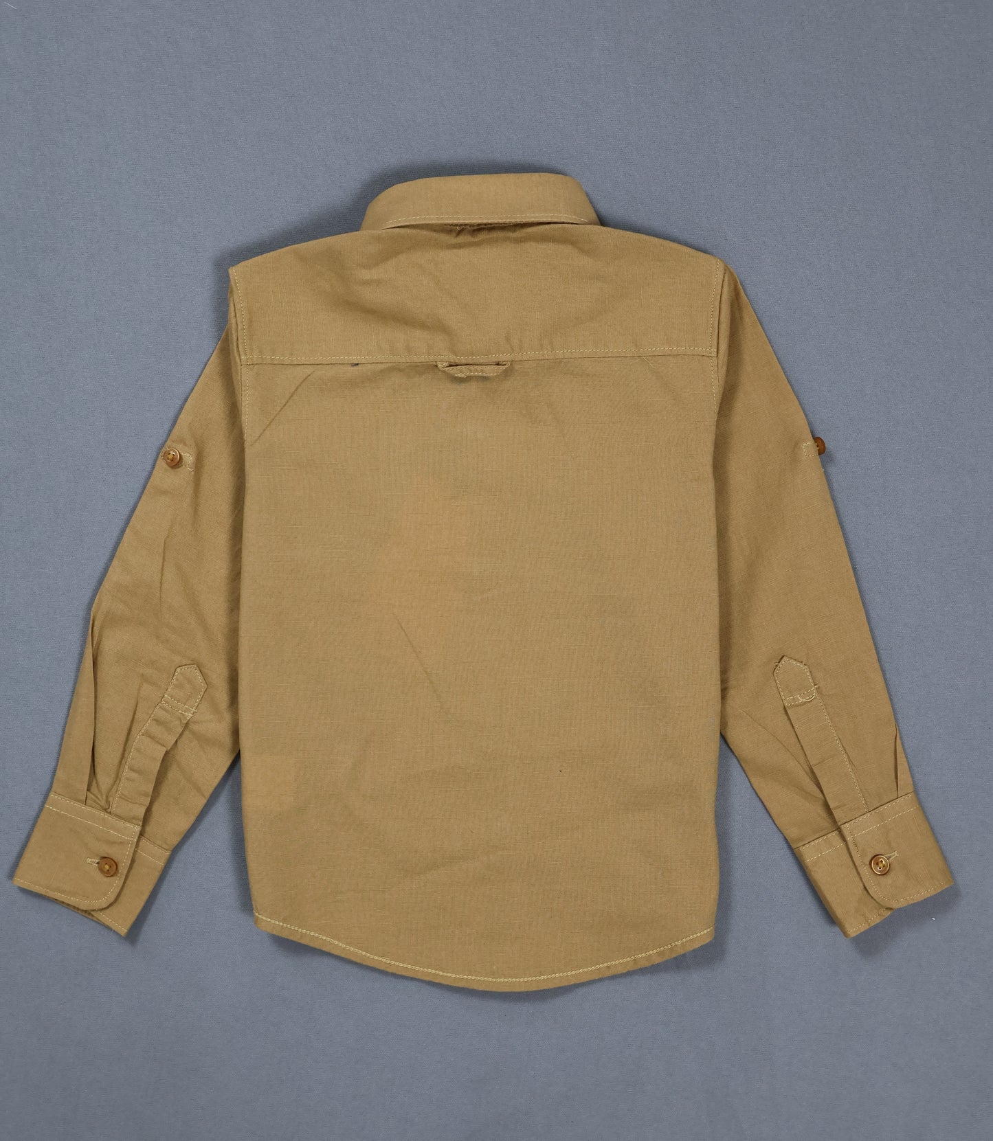 Brown shirt on a gray background