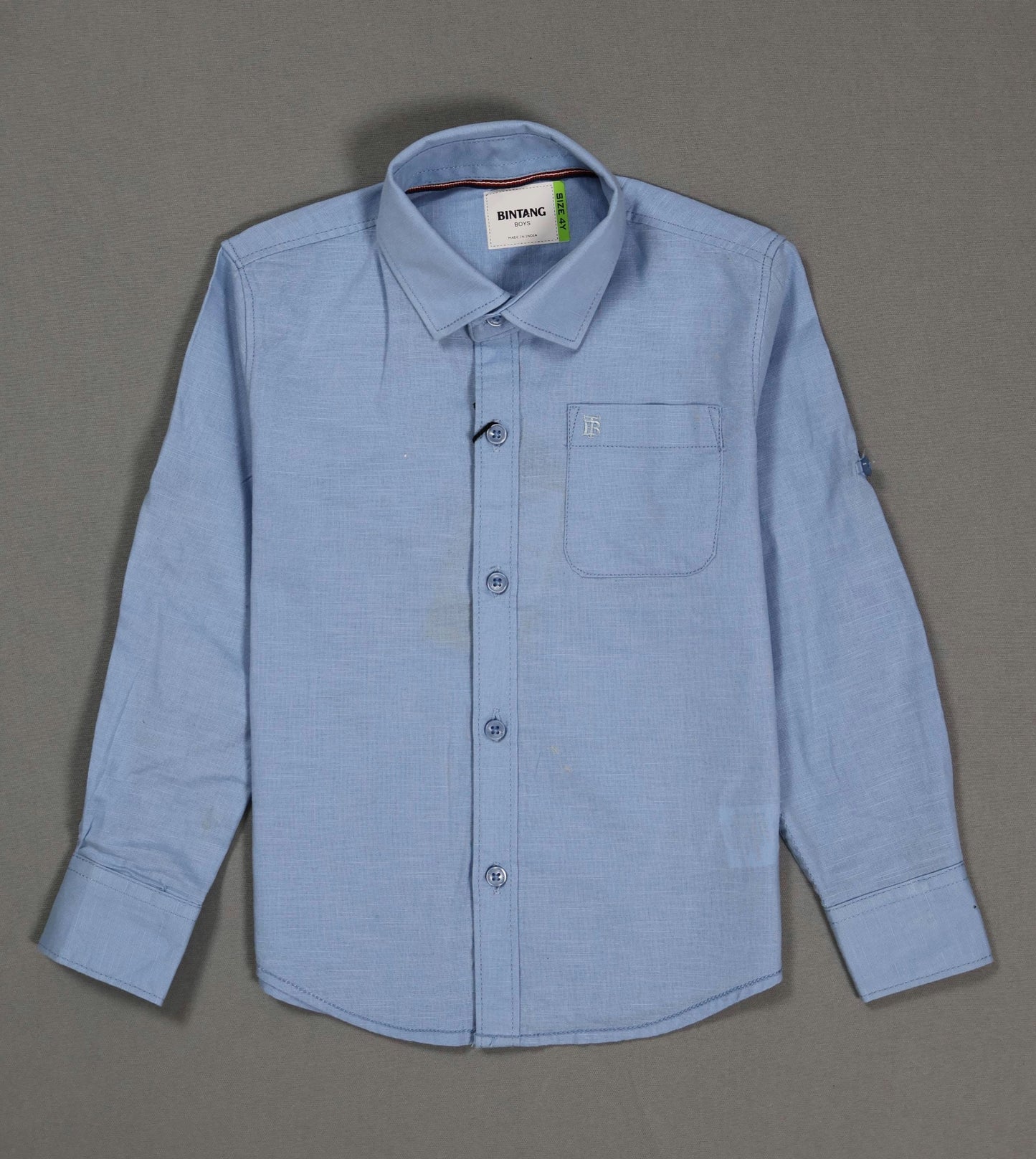 Blue button-up shirt with a collar on a gray background