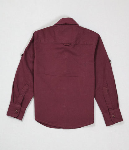 Maroon shirt on a light gray background
