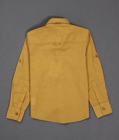 Yellow shirt on a gray background