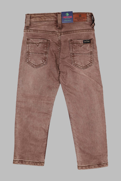 Brown jeans with a visible brand label on a gray background