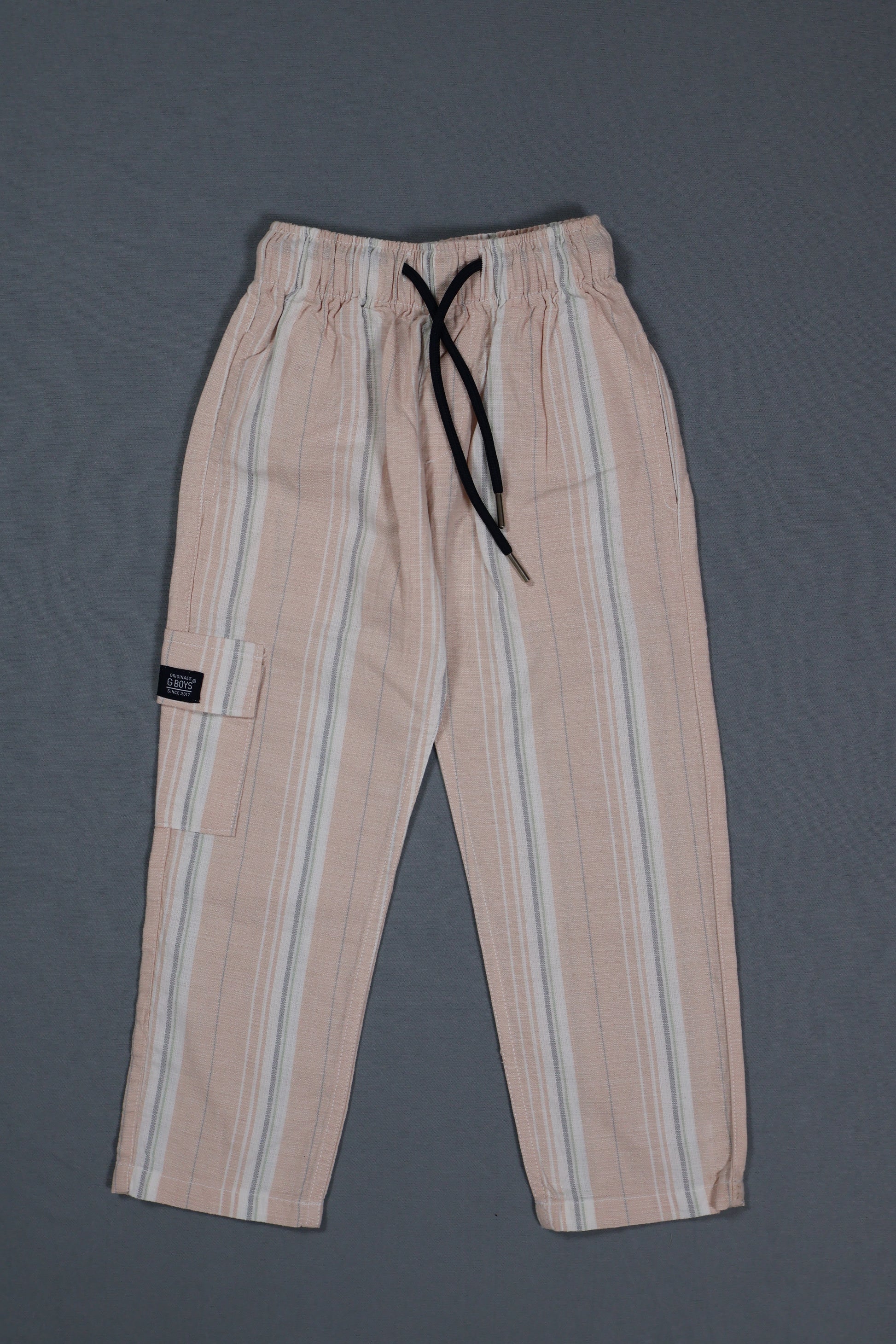 Striped pants with a drawstring on a gray background