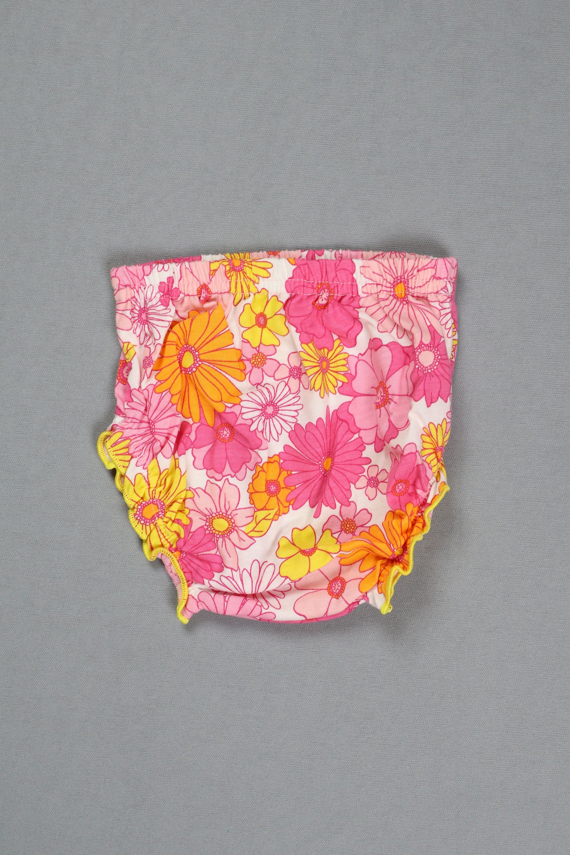 Floral-patterned fabric on a gray background